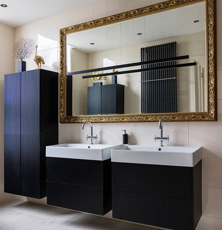 Binnenkijken bij Ron en René: ‘In vier uur tijd kochten we drie badkamers’